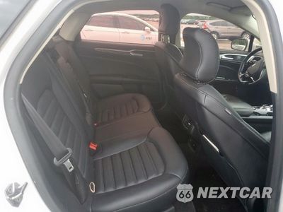 Zdjęcie 10 z 13 samochodu: 2018 FORD FUSION SE HYBRID VIN:3FA6P0LU7JR118655 - miniatura
