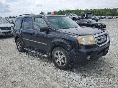 Czwarte zdjęcie samochodu z boku: 2010 HONDA PILOT TOURING VIN:5FNYF4H98AB014498 - miniatura