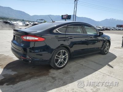 Trzecie zdjęcie samochodu z tyłu: 2016 FORD FUSION TITANIUM VIN:3FA6P0K91GR239719 - miniatura