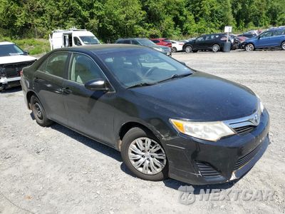 Czwarte zdjęcie samochodu z boku: 2014 TOYOTA CAMRY HYBRID VIN:4T1BD1FK4EU136865 - miniatura