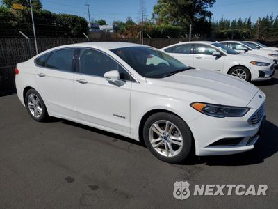 Czwarte zdjęcie samochodu z boku: 2018 FORD FUSION SE HYBRID VIN:3FA6P0LUXJR152461 - miniatura