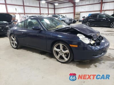 Czwarte zdjęcie samochodu z boku: 1999 PORSCHE 911 CARRERA VIN:WP0AA2995XS621795 - miniatura