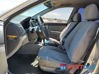 Zdjęcie 7 z 12 samochodu: 2005 KIA SPECTRA EX VIN:KNAFE221895603434 - miniatura