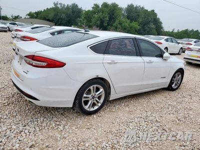 Trzecie zdjęcie samochodu z tyłu: 2018 FORD FUSION SE HYBRID VIN:3FA6P0LU2JR171814 - miniatura