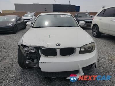 Piąte zdjęcie samochodu w środku: 2011 BMW 128 I VIN:WBAUP9C58BVL90700 - miniatura