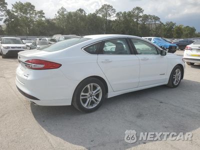 Trzecie zdjęcie samochodu z tyłu: 2018 FORD FUSION SE HYBRID VIN:3FA6P0LU8JR178461 - miniatura