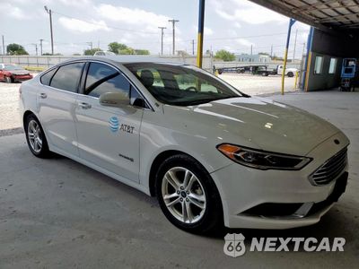 Czwarte zdjęcie samochodu z boku: 2018 FORD FUSION SE HYBRID VIN:3FA6P0LU2JR171893 - miniatura