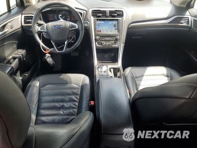 Zdjęcie 8 z 12 samochodu: 2017 FORD FUSION SE HYBRID VIN:3FA6P0LU2HR359582 - miniatura