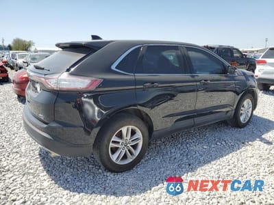 Trzecie zdjęcie samochodu z tyłu: 2017 FORD EDGE SEL VIN:2FMPK4J89HBC04399 - miniatura
