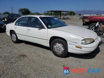 Czwarte zdjęcie samochodu z boku: 2001 CHEVROLET LUMINA VIN:2G1WL52J011271871 - miniatura