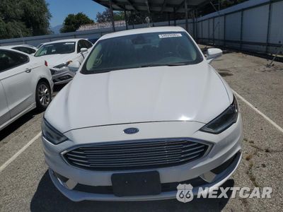 Piąte zdjęcie samochodu w środku: 2018 FORD FUSION SE HYBRID VIN:3FA6P0LU6JR172139 - miniatura