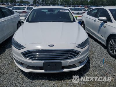 Piąte zdjęcie samochodu w środku: 2017 FORD FUSION SE HYBRID VIN:3FA6P0LU1HR359587 - miniatura