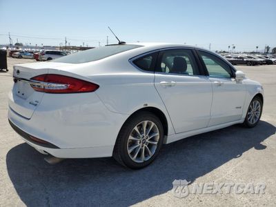 Trzecie zdjęcie samochodu z tyłu: 2017 FORD FUSION SE HYBRID VIN:3FA6P0LUXHR408916 - miniatura