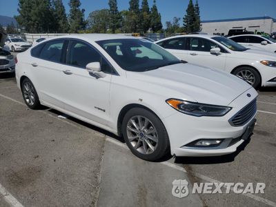 Czwarte zdjęcie samochodu z boku: 2017 FORD FUSION SE HYBRID VIN:3FA6P0LU1HR409761 - miniatura