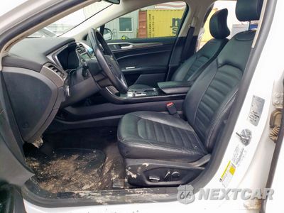 Zdjęcie 7 z 12 samochodu: 2018 FORD FUSION SE HYBRID VIN:3FA6P0LU9JR171664 - miniatura