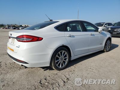 Trzecie zdjęcie samochodu z tyłu: 2017 FORD FUSION SE HYBRID VIN:3FA6P0LU6HR410047 - miniatura