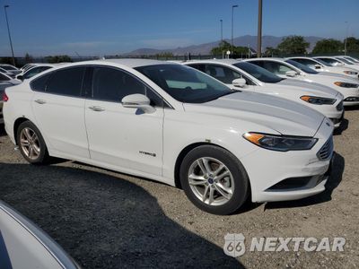 Czwarte zdjęcie samochodu z boku: 2018 FORD FUSION SE HYBRID VIN:3FA6P0LUXJR281865 - miniatura