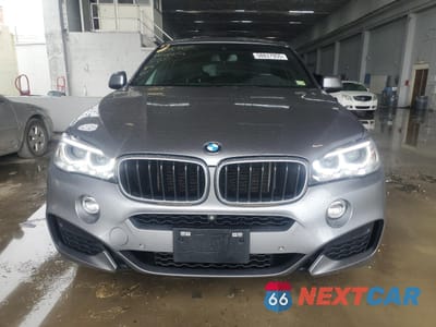 Piąte zdjęcie samochodu w środku: 2019 BMW X6 XDRIVE35I VIN:5UXKU2C58K0Z65951 - miniatura