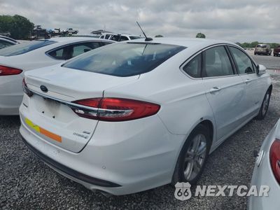 Trzecie zdjęcie samochodu z tyłu: 2018 FORD FUSION SE HYBRID VIN:3FA6P0LU9JR278746 - miniatura