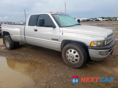 Czwarte zdjęcie samochodu z boku: 2002 DODGE RAM 3500 VIN:3B7MC33C62M290874 - miniatura