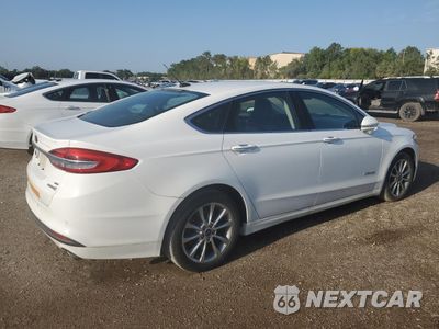Trzecie zdjęcie samochodu z tyłu: 2017 FORD FUSION SE HYBRID VIN:3FA6P0LU3HR409499 - miniatura