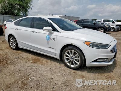 Czwarte zdjęcie samochodu z boku: 2017 FORD FUSION SE HYBRID VIN:3FA6P0LU8HR408977 - miniatura