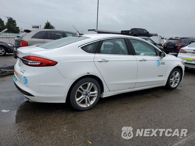 Trzecie zdjęcie samochodu z tyłu: 2018 FORD FUSION SE HYBRID VIN:3FA6P0LU9JR118849 - miniatura
