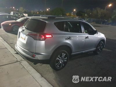 Trzecie zdjęcie samochodu z tyłu: 2018 TOYOTA RAV4 LE VIN:JTMZFREV1JJ191857 - miniatura