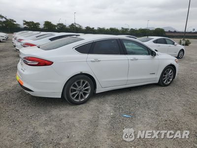 Trzecie zdjęcie samochodu z tyłu: 2017 FORD FUSION SE HYBRID VIN:3FA6P0LU0HR409704 - miniatura
