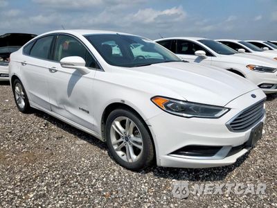 Czwarte zdjęcie samochodu z boku: 2018 FORD FUSION SE HYBRID VIN:3FA6P0LU3JR171689 - miniatura