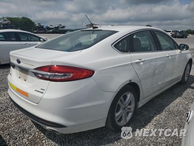 Trzecie zdjęcie samochodu z tyłu: 2018 FORD FUSION SE HYBRID VIN:3FA6P0LU2JR171960 - miniatura