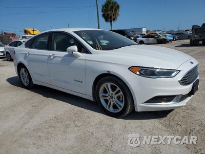 Czwarte zdjęcie samochodu z boku: 2018 FORD FUSION SE HYBRID VIN:3FA6P0LU8JR278706 - miniatura
