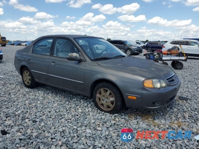 Czwarte zdjęcie samochodu z boku: 2003 KIA SPECTRA GS VIN:KNAFB161535127907 - miniatura