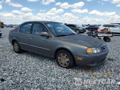 Czwarte zdjęcie samochodu z boku: 2003 KIA SPECTRA GS VIN:KNAFB161535127907 - miniatura
