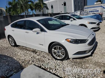 Czwarte zdjęcie samochodu z boku: 2018 FORD FUSION SE HYBRID VIN:3FA6P0LU4JR171992 - miniatura