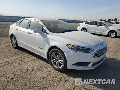 Czwarte zdjęcie samochodu z boku: 2018 FORD FUSION SE HYBRID VIN:3FA6P0LU6JR281877 - miniatura