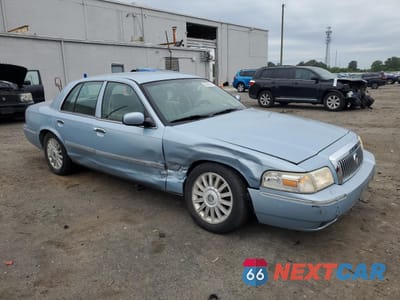 Czwarte zdjęcie samochodu z boku: 2010 MERCURY GRAND MARQUIS LS VIN:2MEBM7FV8AX635848 - miniatura