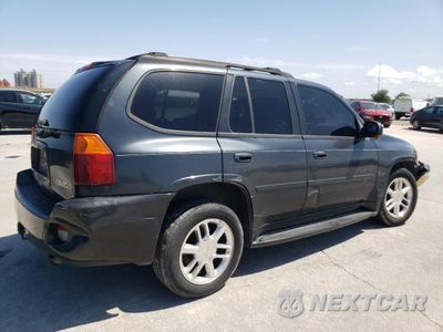 Trzecie zdjęcie samochodu z tyłu: 2006 GMC ENVOY DENALI VIN:1GKES63M162212926 - miniatura
