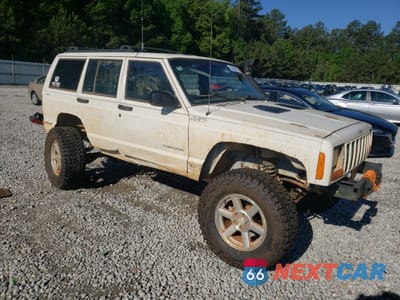 Czwarte zdjęcie samochodu z boku: 2000 JEEP CHEROKEE SPORT VIN:1J4FF48S0YL231653 - miniatura