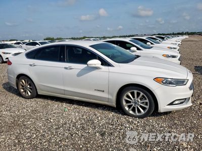 Czwarte zdjęcie samochodu z boku: 2017 FORD FUSION SE HYBRID VIN:3FA6P0LUXHR409001 - miniatura