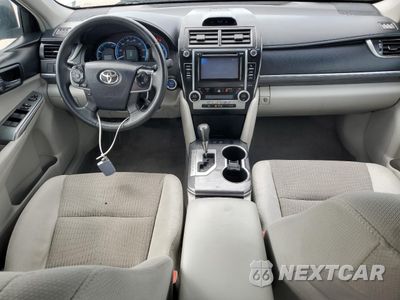 Zdjęcie 8 z 14 samochodu: 2012 TOYOTA CAMRY HYBRID VIN:4T1BD1FK3CU047835 - miniatura