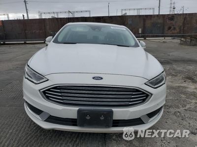 Piąte zdjęcie samochodu w środku: 2018 FORD FUSION SE HYBRID VIN:3FA6P0LU1JR171903 - miniatura