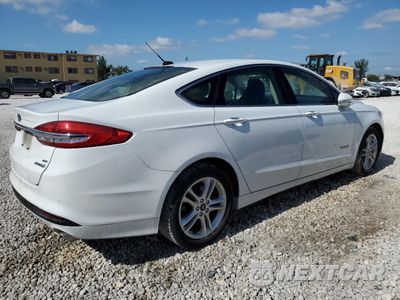 Trzecie zdjęcie samochodu z tyłu: 2018 FORD FUSION SE HYBRID VIN:3FA6P0LUXJR278707 - miniatura