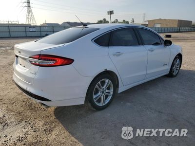 Trzecie zdjęcie samochodu z tyłu: 2018 FORD FUSION SE HYBRID VIN:3FA6P0LU1JR129862 - miniatura