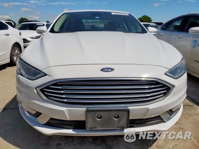 Piąte zdjęcie samochodu w środku: 2017 FORD FUSION SE HYBRID VIN:3FA6P0LU9HR409068 - miniatura
