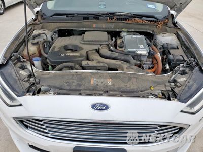 Zdjęcie 11 z 12 samochodu: 2018 FORD FUSION SE HYBRID VIN:3FA6P0LU6JR171881 - miniatura
