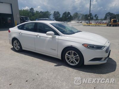 Czwarte zdjęcie samochodu z boku: 2018 FORD FUSION SE HYBRID VIN:3FA6P0LU4JR171989 - miniatura