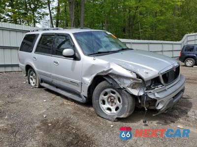 Czwarte zdjęcie samochodu z boku: 1999 LINCOLN NAVIGATOR VIN:5LMPU28A7XLJ31116 - miniatura