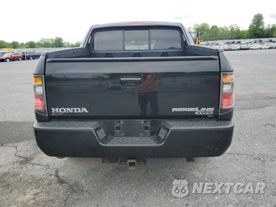 Zdjęcie 6 z 14 samochodu: 2007 HONDA RIDGELINE RTX VIN:2HJYK16387H507380 - miniatura
