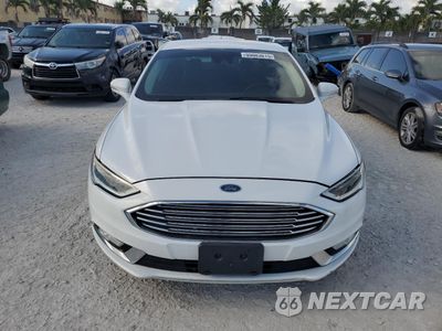 Piąte zdjęcie samochodu w środku: 2017 FORD FUSION SE HYBRID VIN:3FA6P0LU9HR359563 - miniatura